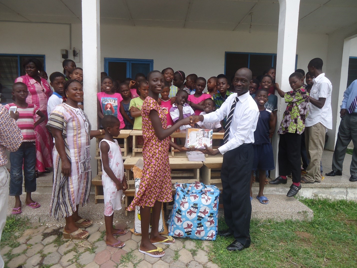 Leading Vision visiting children at the Village of Hope
